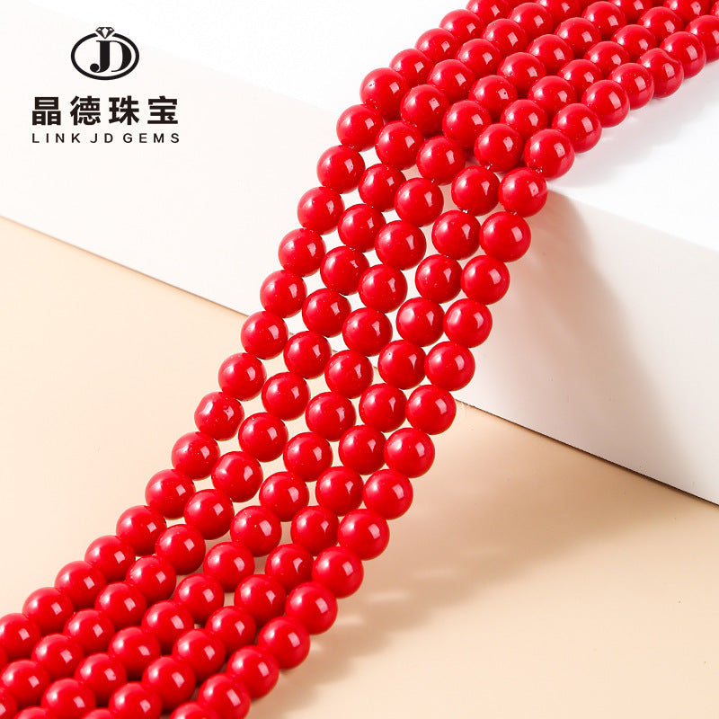Perlas sintéticas lacadas en rojo 