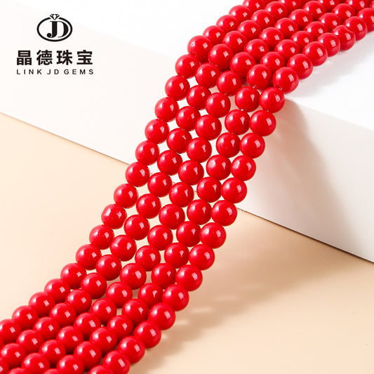 Perlas sintéticas lacadas en rojo 