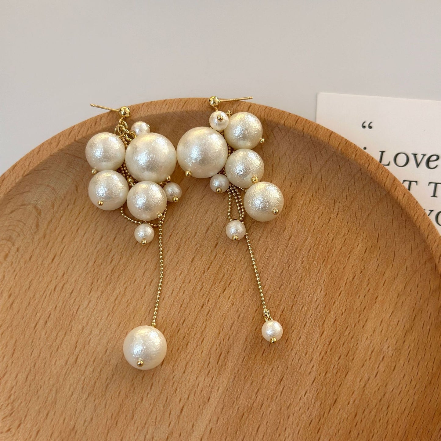 Cotton pearl fringed stud earrings