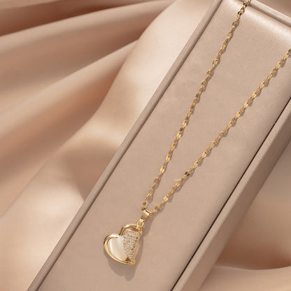 Colar de aço inoxidável banhado a ouro com pingente de olho de gato 