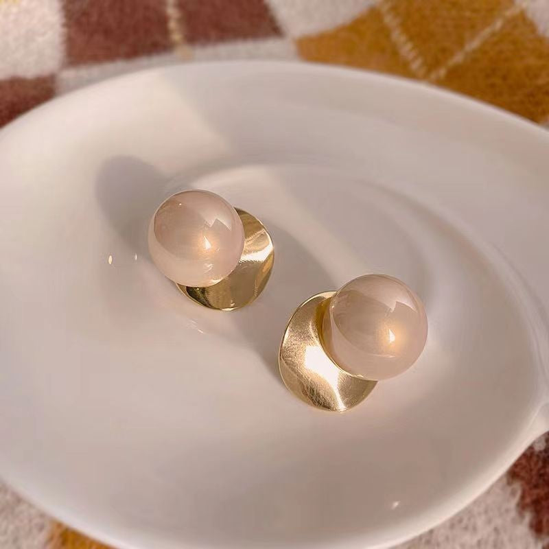 Big pink pearl stud earrings