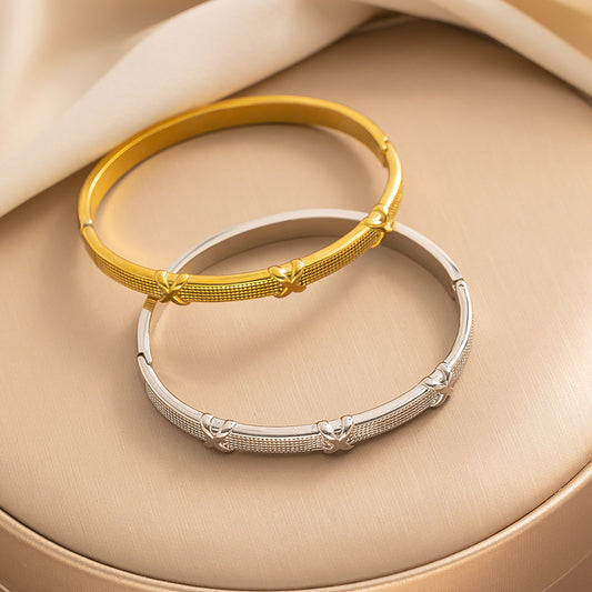 Brazalete Fénix minimalista de acero y titanio - Acabado brillante 