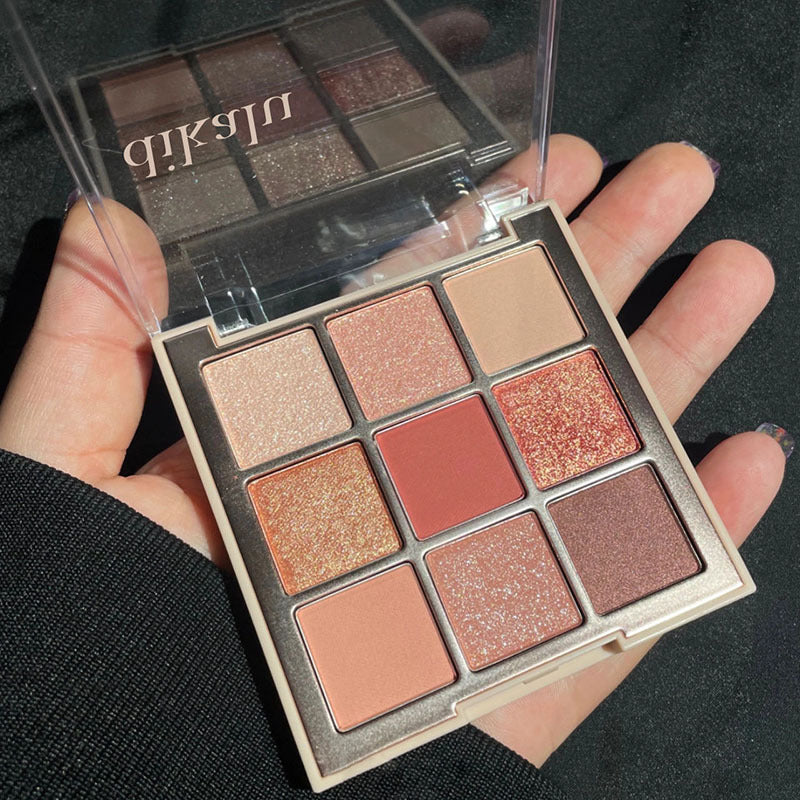 Paleta de sombras de ojos acrílicas transparentes de nueve colores 