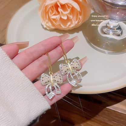 Bow pearl earrings for women