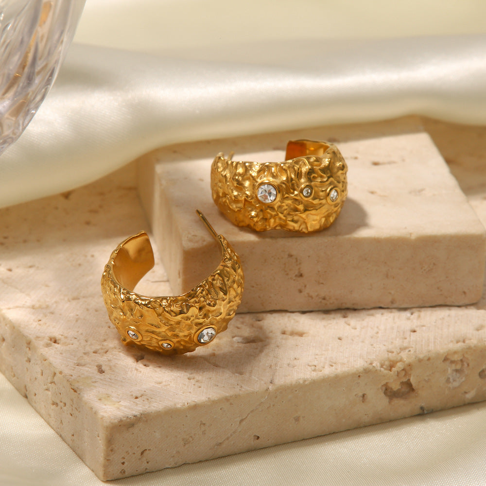 C-shaped white diamond earrings