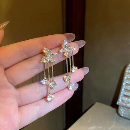 Pendientes de mariposa con borlas de diamantes 
