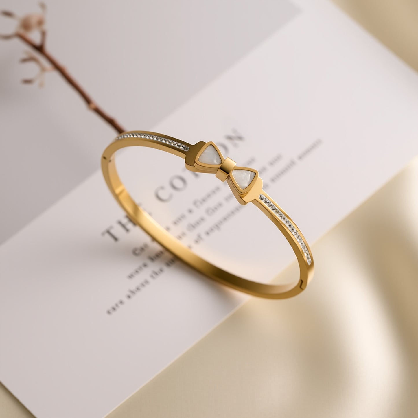 Titanium Steel Bow Bracelet with White Shell & Crystal Clasp