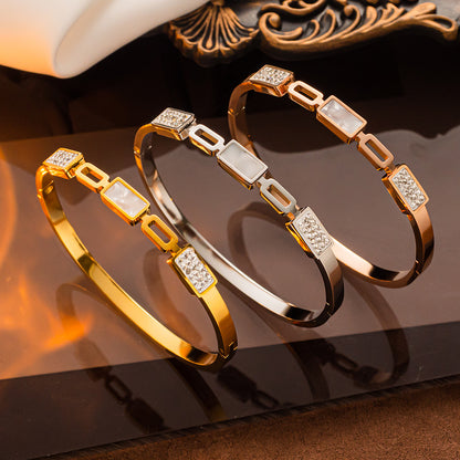 Pulseira de aço inoxidável banhada a ouro, atacado feminino elegante 