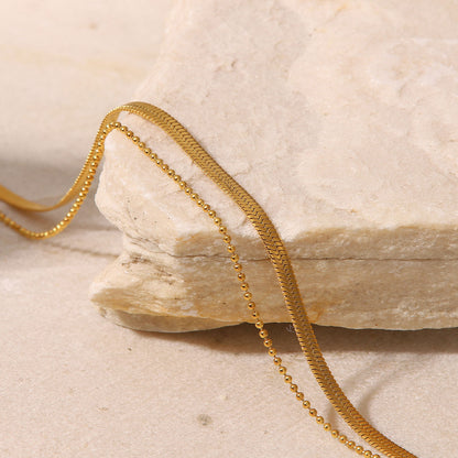 Tobillera de doble capa con cadena de serpiente y cuentas pequeñas 