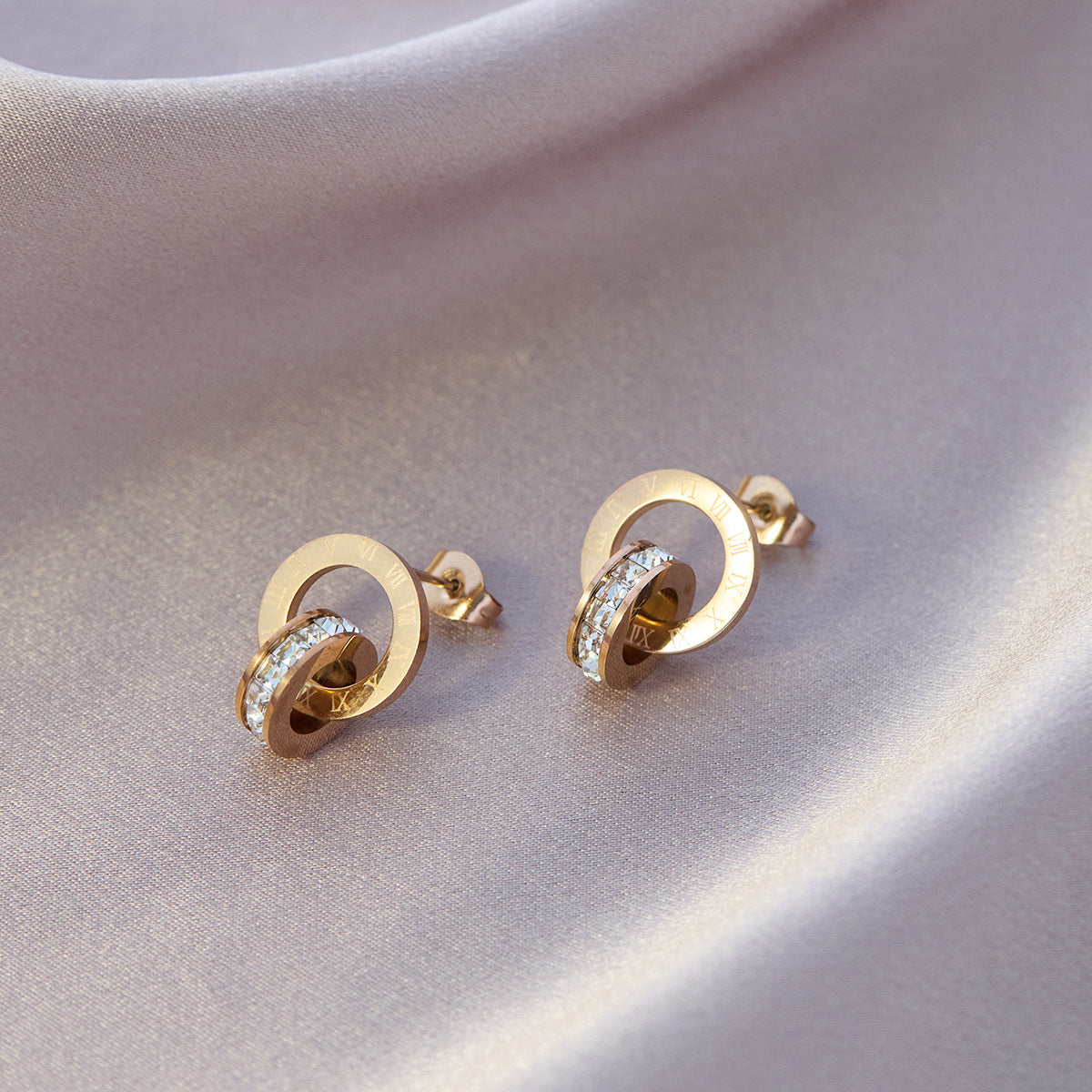 Four-leaf clover titanium steel ear buckle