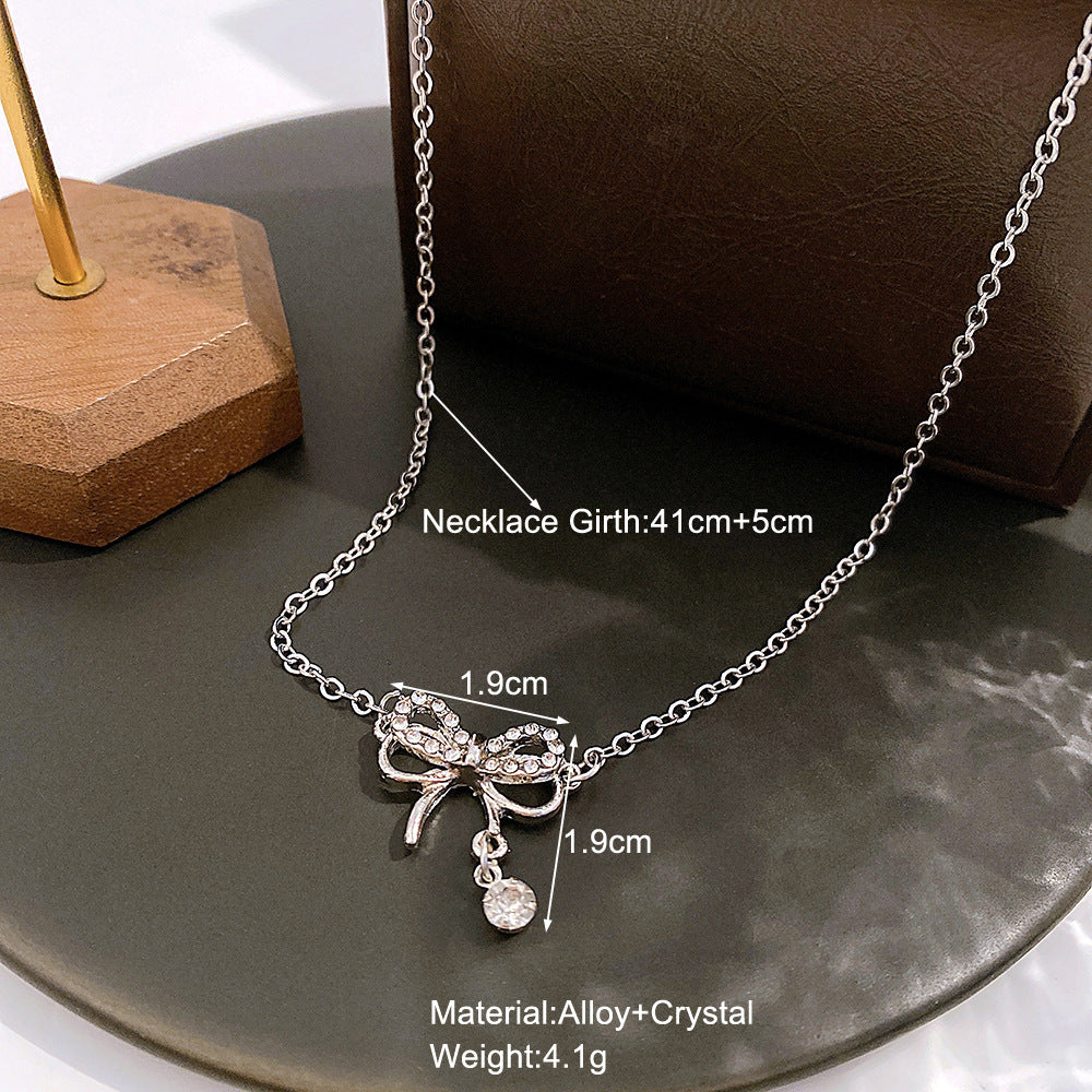 Diamond Bow Pendant Necklace