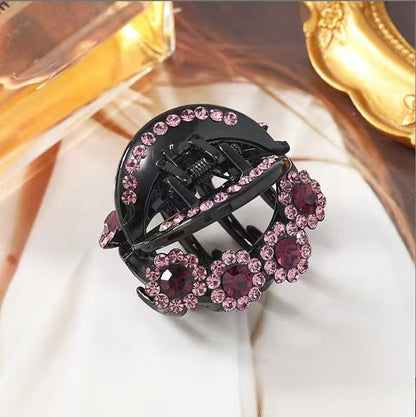 Pinza con forma de garra con diseño floral y diamantes de imitación 