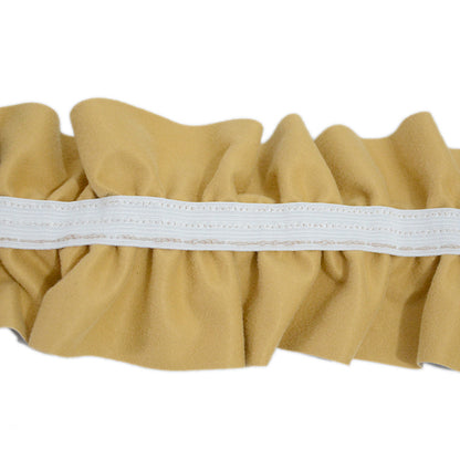 Elastic pleated edge belt