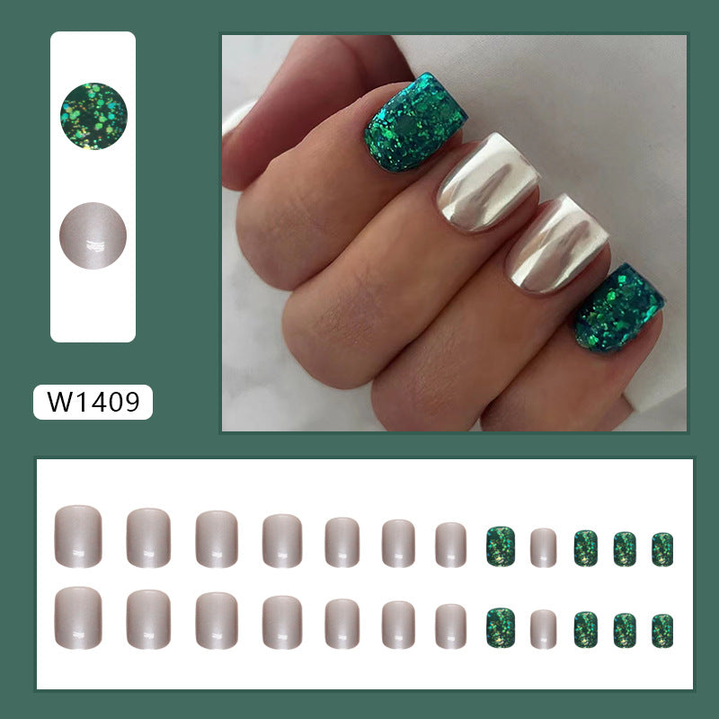 Uñas postizas cuadradas cortas con purpurina Aurora en color verde oscuro 