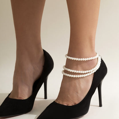 Tobillera estilo étnico con borlas y lentejuelas 