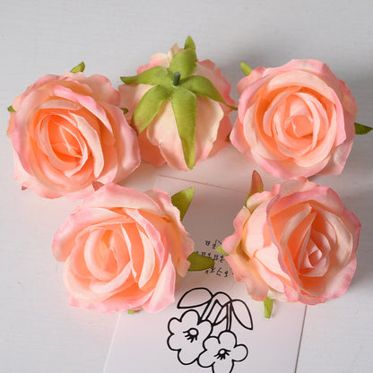 Artificial rose flower head