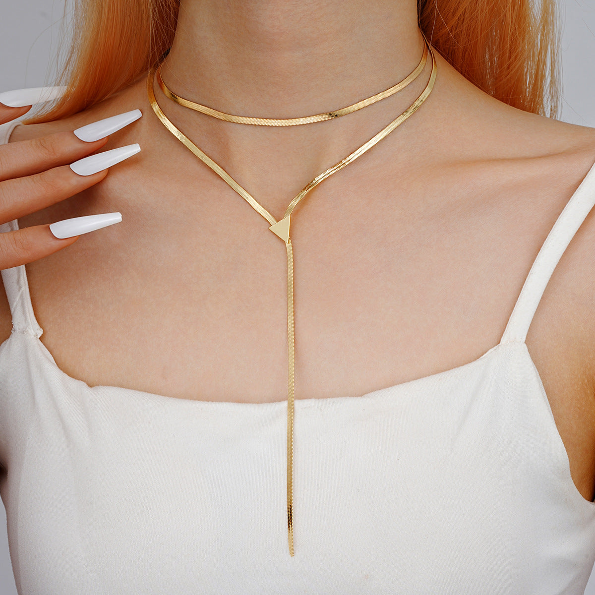 Gold Snake Bone Fringe Necklace