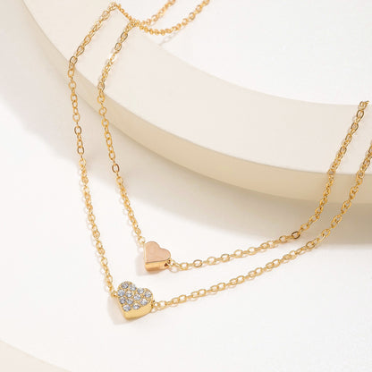 Pequeño collar de corazón de doble capa estilo Chanel 