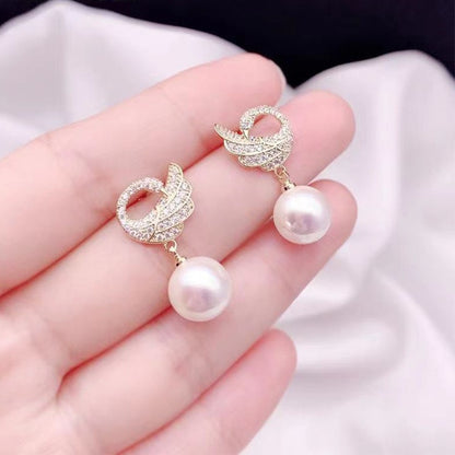 Diamond swan pearl stud earrings