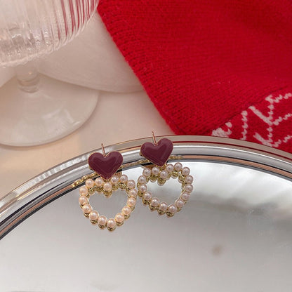 Pendientes de perla roja del amor 