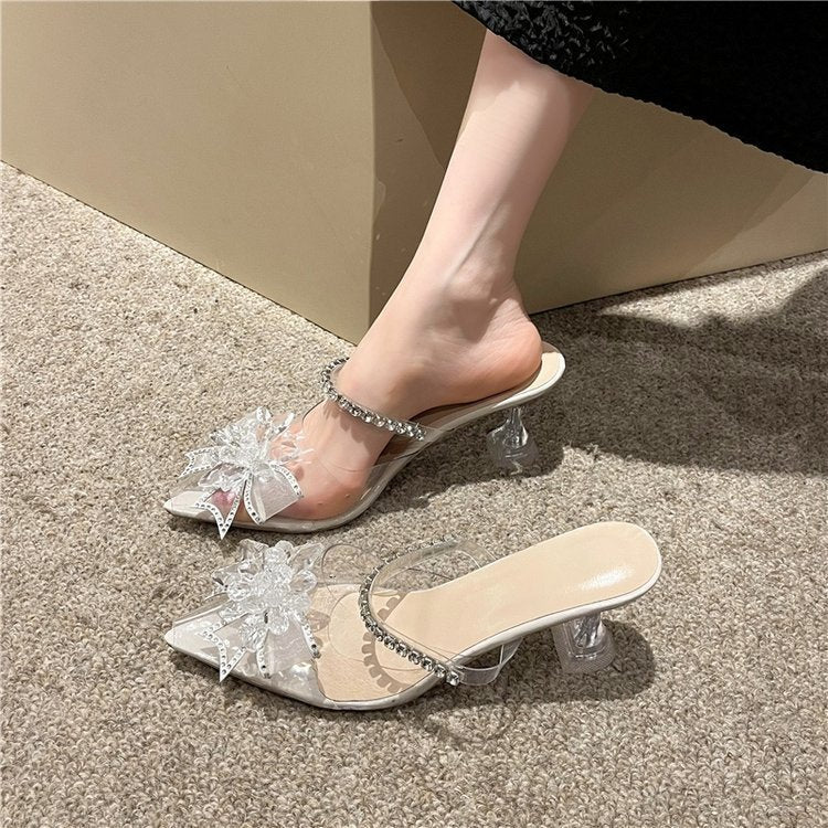 Stiletto slippers with high heels