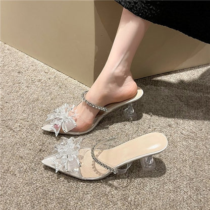 Stiletto slippers with high heels