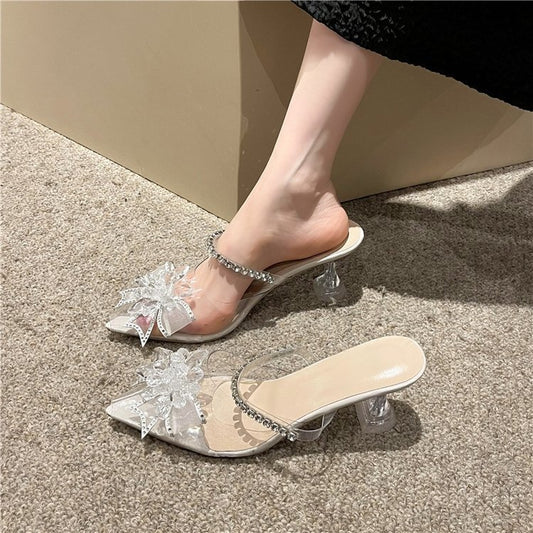 Stiletto slippers with high heels