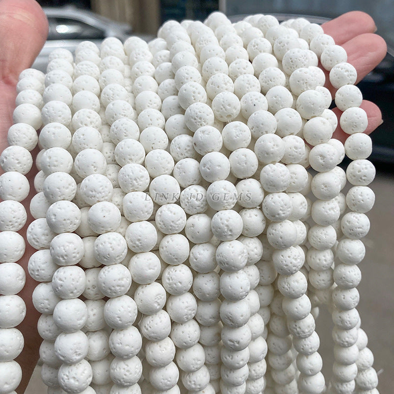 Perlas sueltas de piedra volcánica blanca 