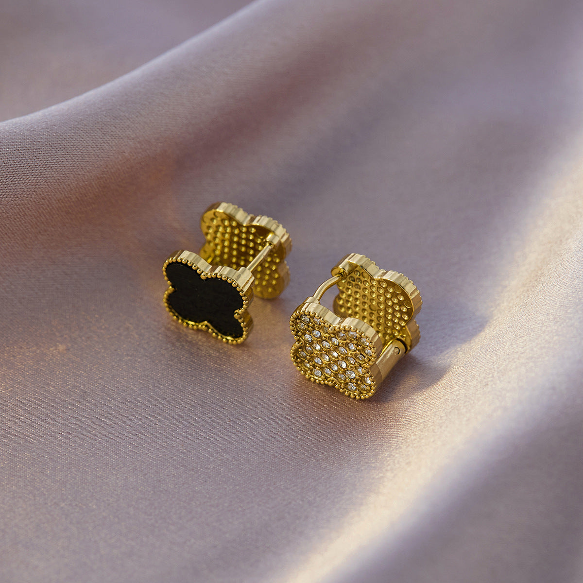 Four-leaf clover titanium steel ear buckle