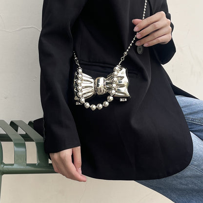 Bow metal earphone bag