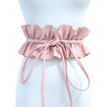 Elastic pleated edge belt