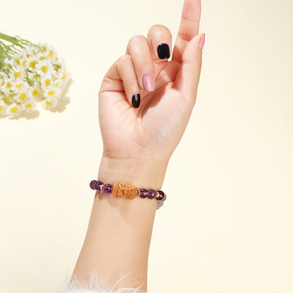 Gray moonstone and amethyst sandalwood Tara bracelet.