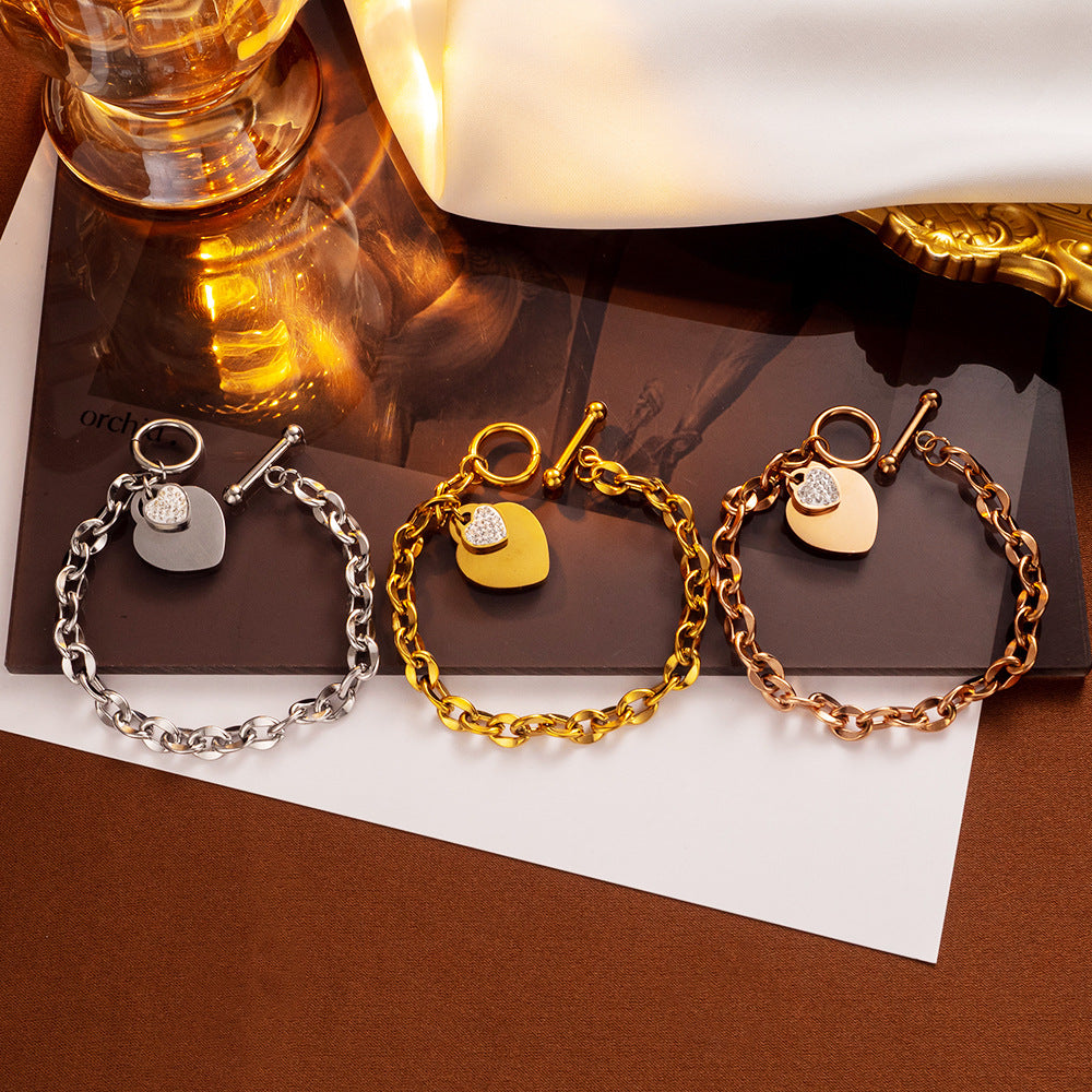 Pulseira Simple Heart Titanium em ouro 18k com fecho em T 