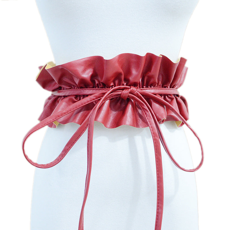 Elastic pleated edge belt