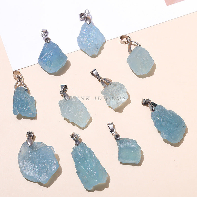 Aquamarine irregular rough stone pendant.
