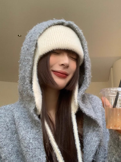 Acogedor gorro con orejeras de mohair para invierno 