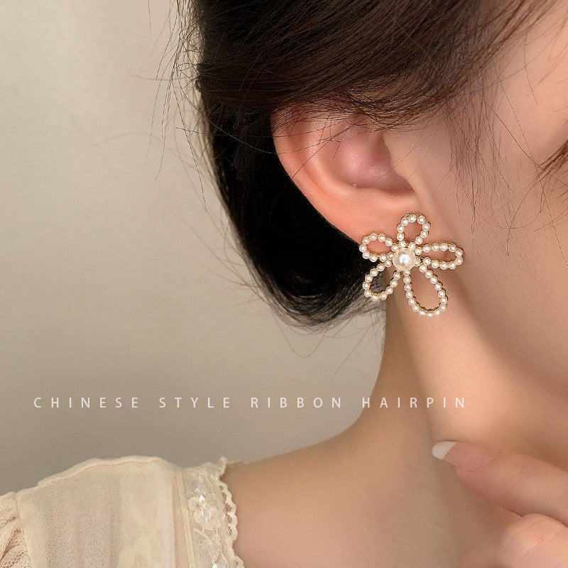 Pearl delicate flower stud earrings wholesale