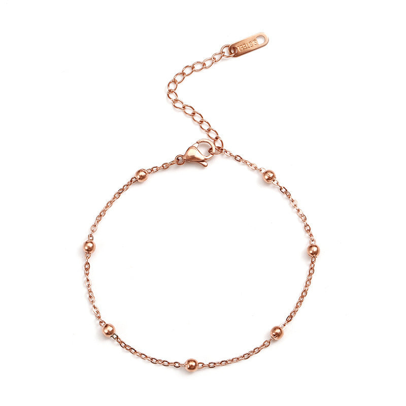 Elegante pulseira de contas em ouro rosa 18K em aço titânio 