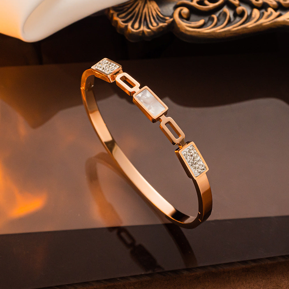 Pulseira de aço inoxidável banhada a ouro, atacado feminino elegante 