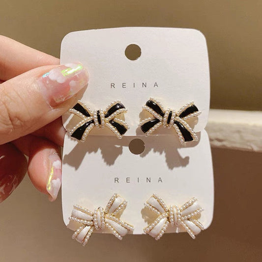 Pendientes con flecos de perlas y lazo de aguja de plata S925