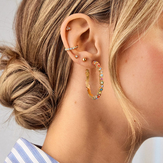 Round earrings with fancy colored diamonds