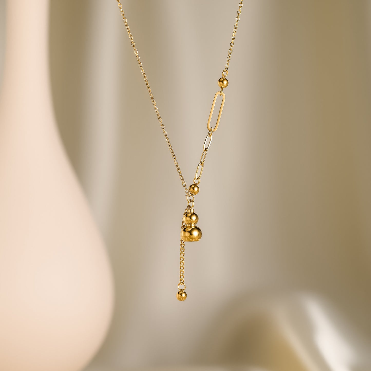 Women's Titanium Steel Gourd Pendant Necklace — Fringe Spliced Collarbone Chain, 18K Gold-Plated