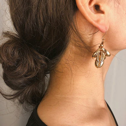 Pendientes vintage con forma de botón 
