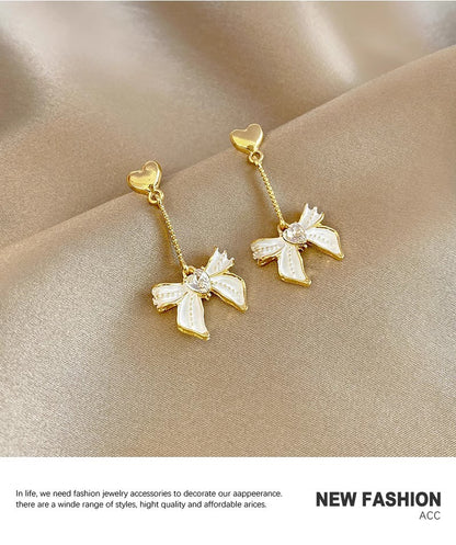 Tassel oil drop bow earrings