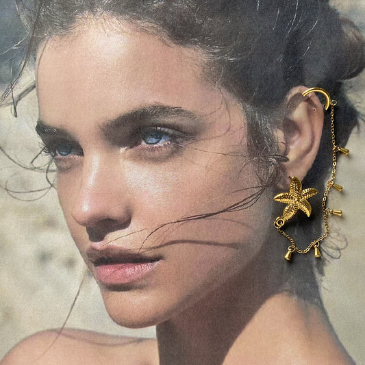 Single starfish teardrop ear clip