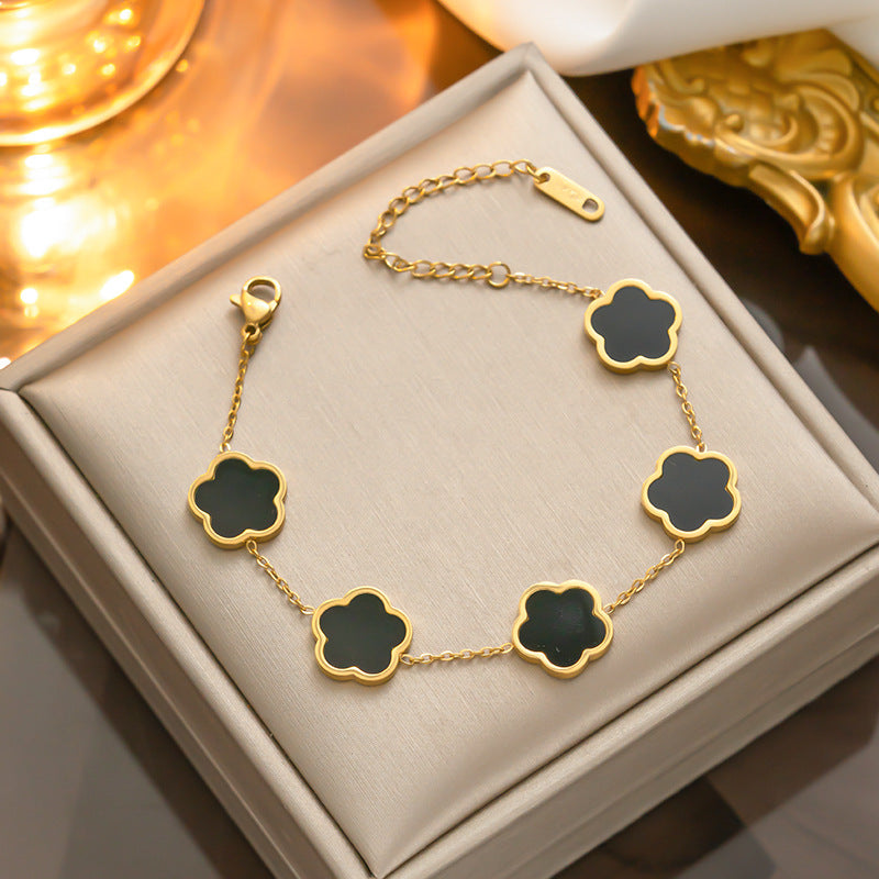 Pulsera de nácar de oro y acero titanio - De moda