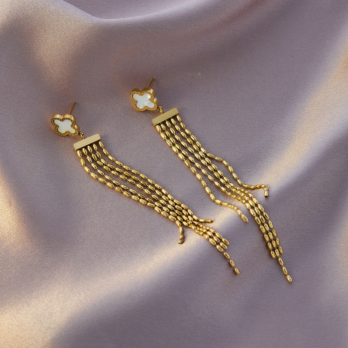 Four-leaf clover titanium steel ear buckle