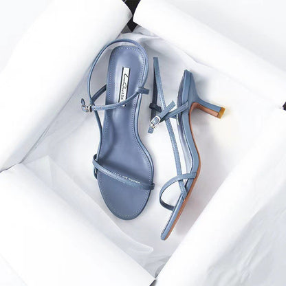 Stiletto heels with a buckled heel