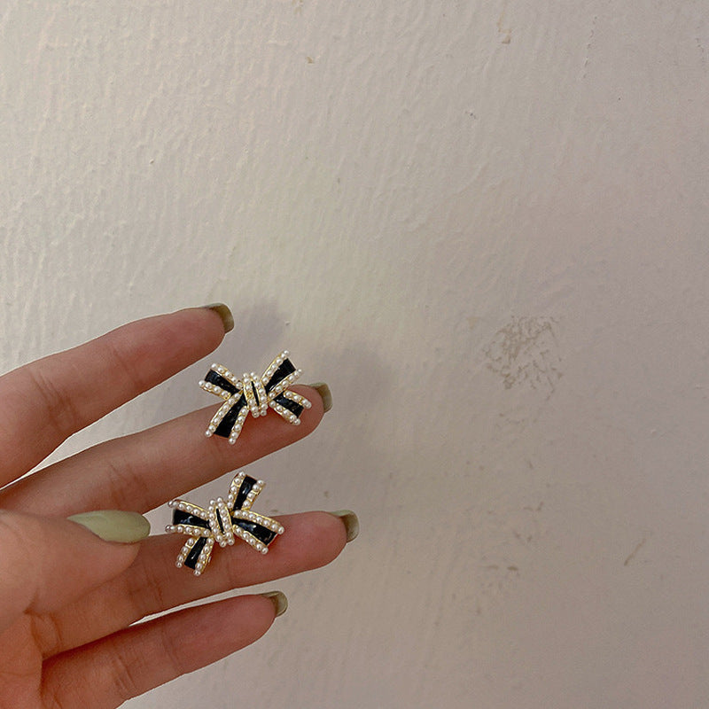 Pendientes con flecos de perlas y lazo de aguja de plata S925