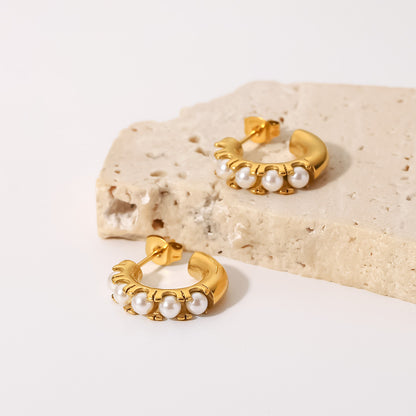 Pearl inlaid C-shaped earrings